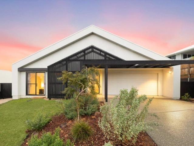 Near New Coastal Sanctuary Designed for Flexible Family Living