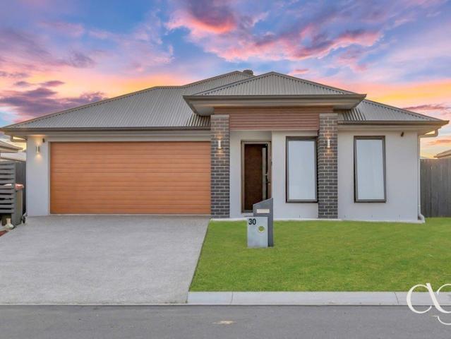 near new coral home with smart technology, solar & premium upgrades