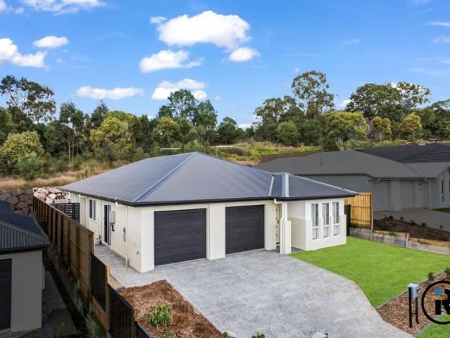 Near New Duplex Home in Logan Reserve