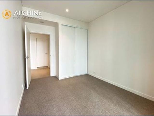Near new east facing one bedroom plus study with large balcony, secure parking and storage