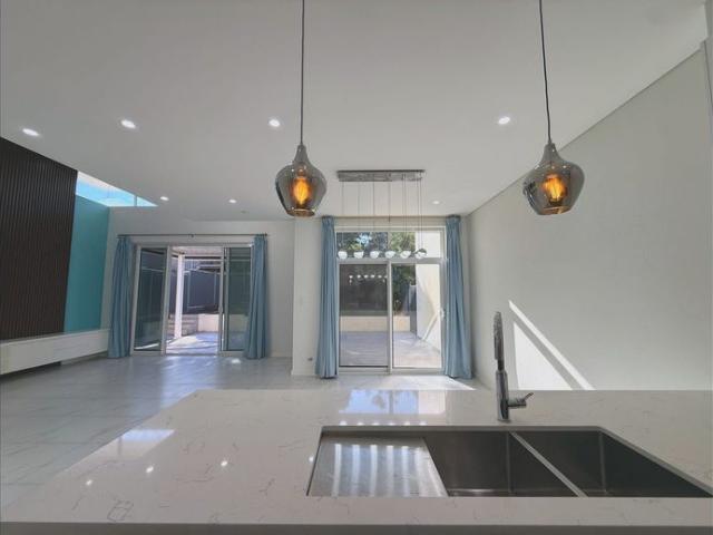Near New Family Duplex with 5 Bedrooms & Expansive Backyard