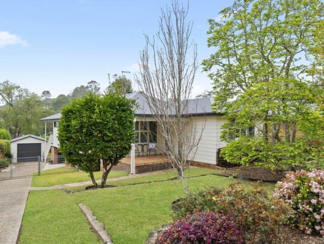 Near new family home with large, flat, sun filled backyard
