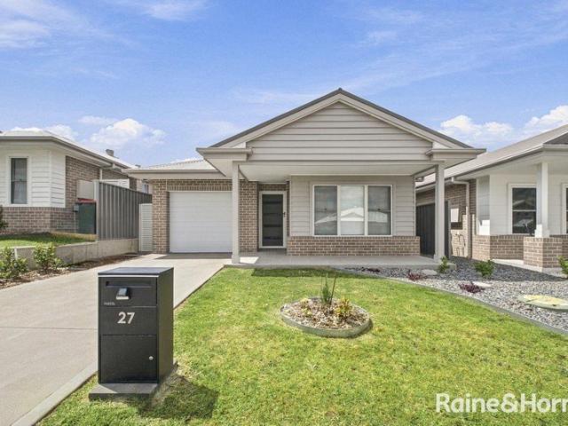 NEAR NEW FAMILY HOME WITH TWO LIVING AREAS!