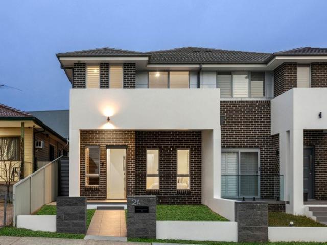 Near new family home in a fantastic location with rear street access