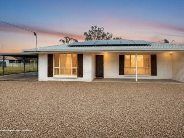 Near New Family Home on 1* Acre with Space & Convenience