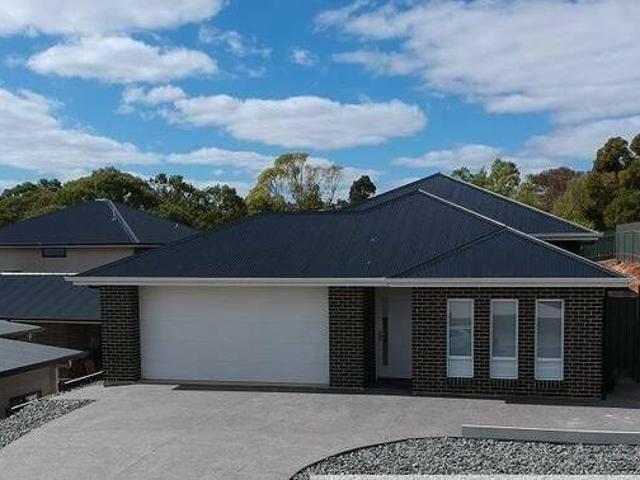 Near New Four Bedroom Home