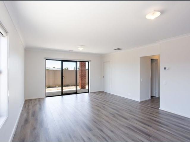 NEAR NEW FOUR BEDROOM HOME IN PRIME LOCATION