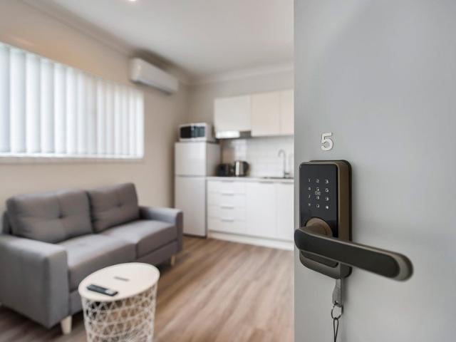 NEAR NEW, FULLY FURNISHED, DESIGNER STUDIO APARTMENT BILLS INCLUDED