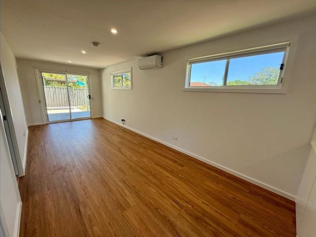 NEAR NEW GRANNY FLAT WITH SECURE PARKING + CARPORT!