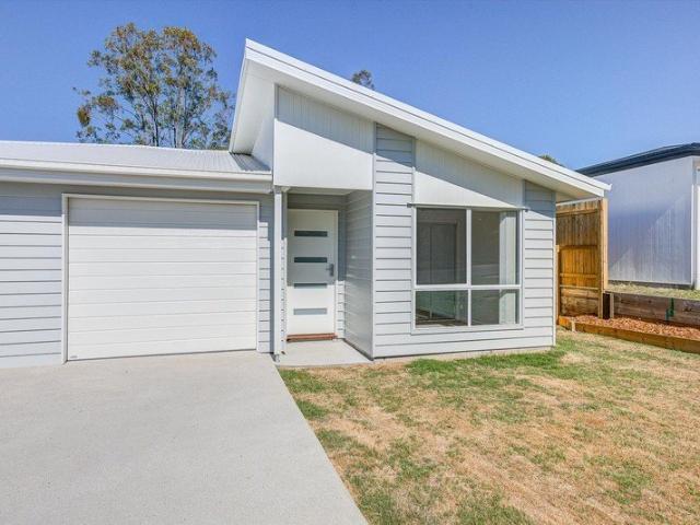 Near New Home with Large Yard and Close to Town!