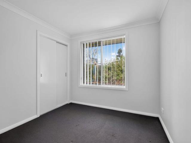 Near new home with THREE living areas