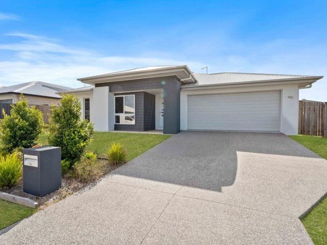 Near New Living in the Highly Sought After Springs Estate