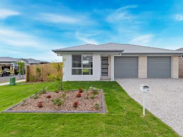 NEAR NEW, LOW MAINTENANCE 4 BEDROOM HOME !