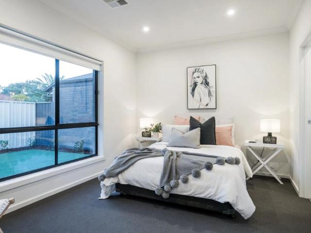 Near new low maintenance home in enviable location