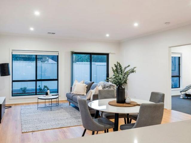 Near new low maintenance home in enviable location