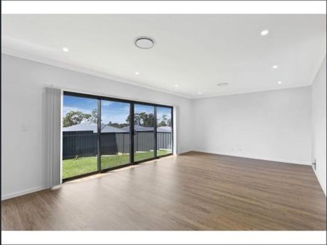 NEAR NEW MODERN 4 BEDROOM HOME