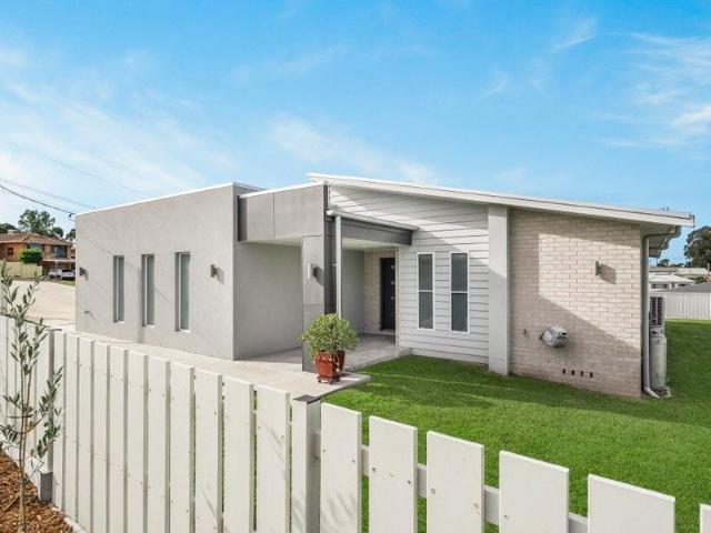 Dual Occupancy Opportunity with Near New Modern Brick Home on Ross Hill