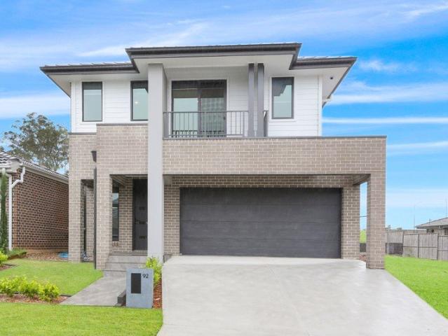 Near New Modern Four Bedroom Home!