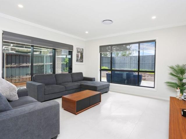 Near New Modern Four Bedroom Home!