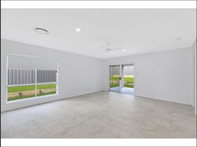 NEAR NEW MODERN FAMILY HOME IN GREAT LOCATION