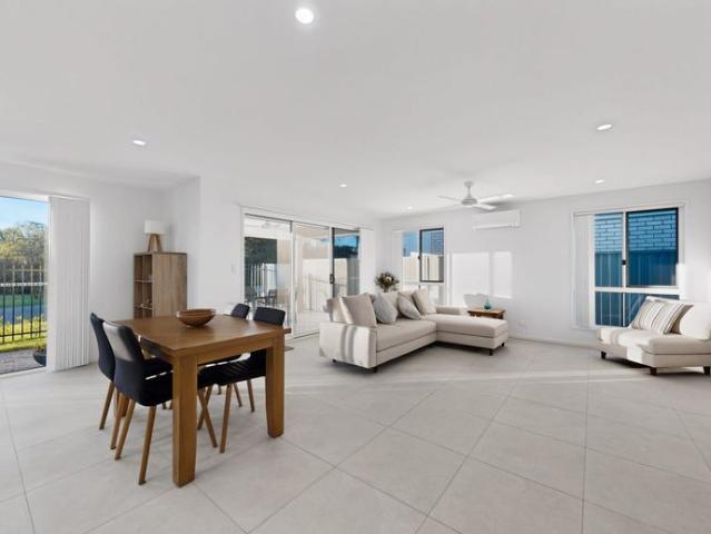 Near New Modern Family Home with spacious open plan living