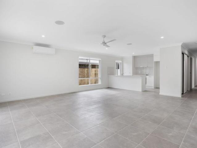 NEAR NEW MODERN HOME!