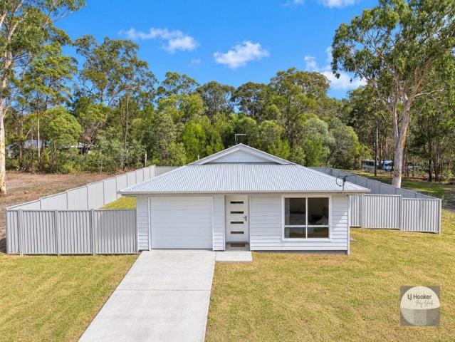 Near New, Modern & Low Maintenance Living in a Peaceful Setting