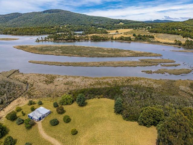 Near Waterfront Opportunity with Endless Potential on 3.2 Acres