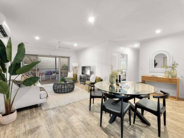 Neighbourhood chatter: This ground floor residence comes with a huge deck and backyard