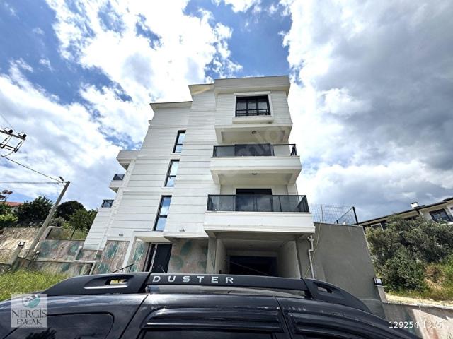NERGİSTEN GÜRE'DE HAVUZLU TERASLI K. OTOPARKLI SATILIK 1+1 DAİRE