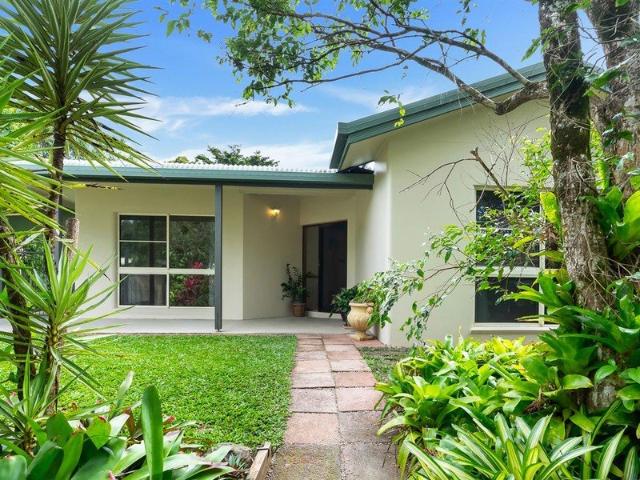 Nestled amongst lush tropical gardens, this spacious five bedroom family home offers the perfect combination of comfort, space, and privacy