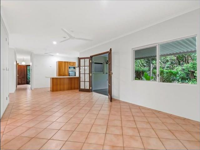 Nestled amongst lush tropical gardens, this spacious five bedroom family home offers the perfect combination of comfort, space, and privacy