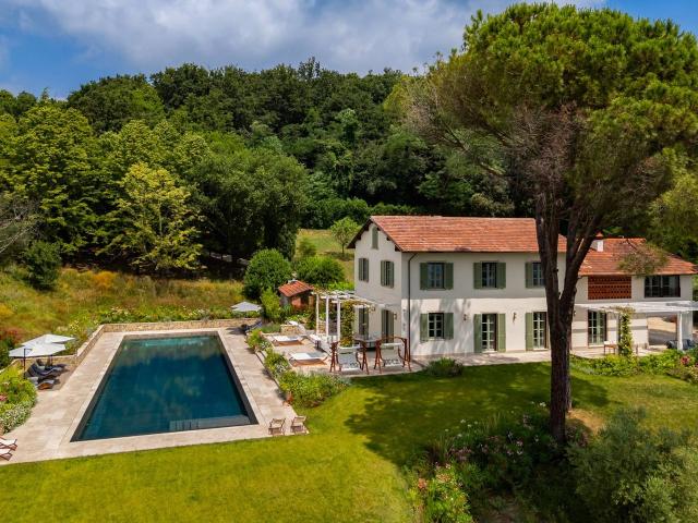 Nestled in the heart of the gentle Lucchese countryside, surrounded by rolling hills and offering breathtaking open views over the city of Lucca, the villa provides a serene and scenic retreat in every season