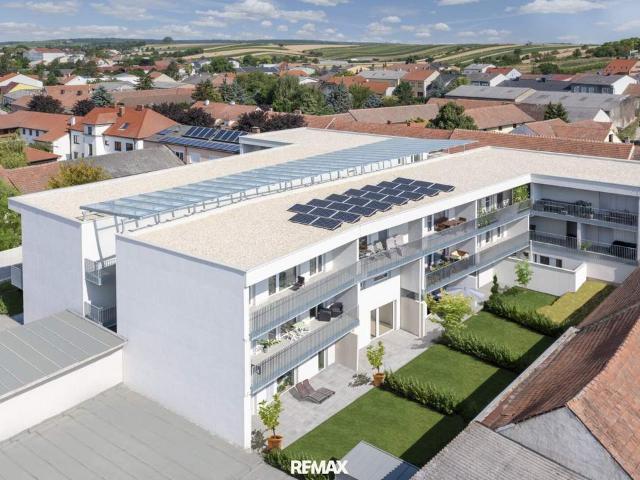 Neuwertige Familien Wohnung inkl. Tiefgaragenparkplatz