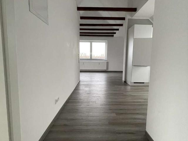 Neuwertige 2 Raum Dachgeschosswohnung mit Balkon und Einbauküche in Wunstorf