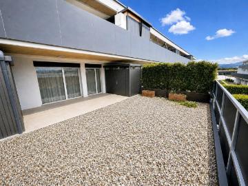 Neuwertige 2 Zimmer Eigentumswohnung mit großer Sonnenterrasse und Carportstellplatz
