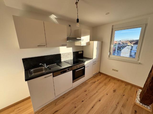 Neuwertige 2 Zimmer Wohnung 60,50 m² im Herzen von Burgau