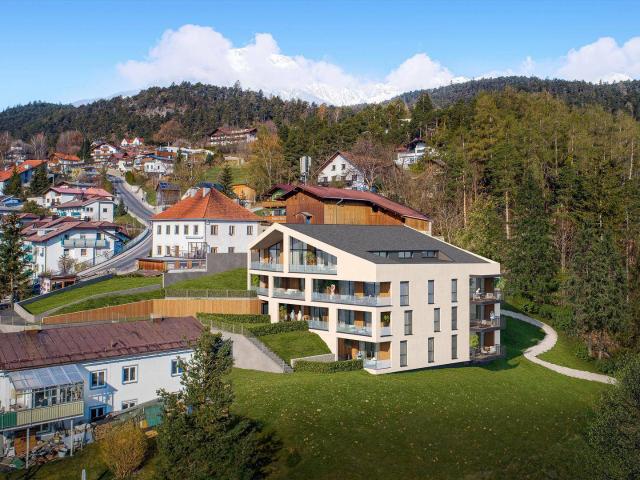 Neuwertige 2 Zimmer Wohnung mit großem Garten und Terrasse in bester Lage
