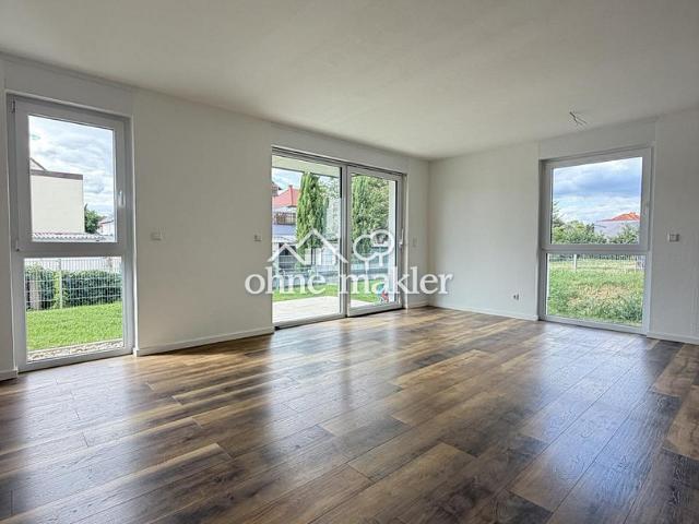 Neuwertige 3 Zi EG WHG mit Terrasse und Garten