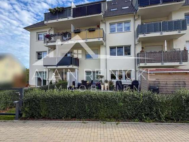 Neuwertige 3 Zimmer Maisonette mit Südterrasse, Gartenanteil & Tiefgarage