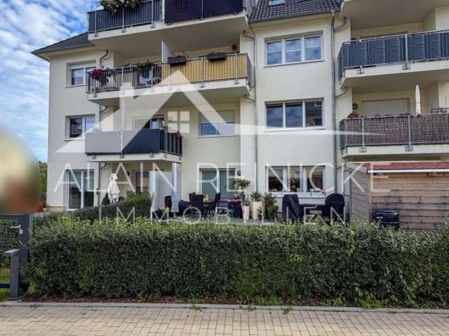 Neuwertige 3 Zimmer Maisonette mit Südterrasse, Gartenanteil & Tiefgarage