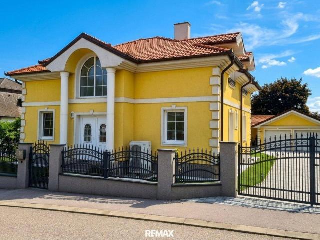 Neuwertiges 5 Zi. Einfamilienhaus mit Pool, 2 Terrassen & 2 Garagen in Deutsch Haslau!