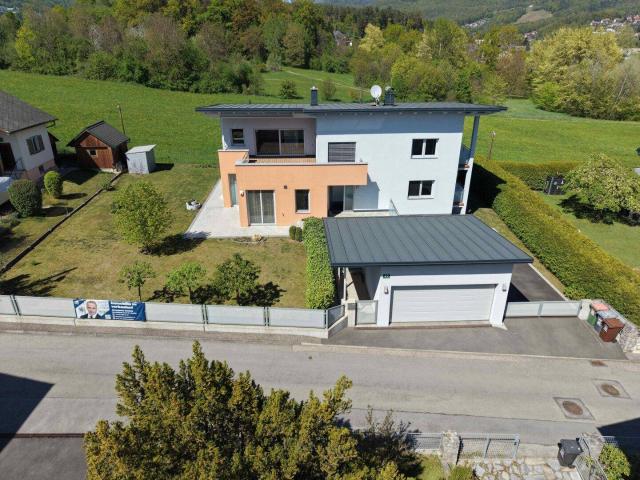 Neuwertiges Zweifamilienhaus bzw. Wohnhaus mit Büro oder Praxismöglichkeit sowie Garten in Graz – Ihr Traum vom Wohnen!