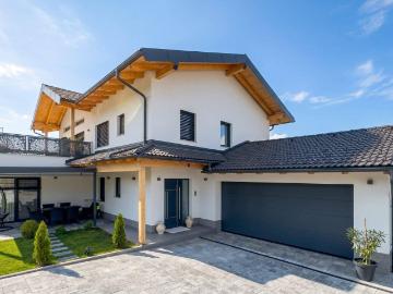Neuwertiges Familienhaus mit großzügigem Raumkonzept Bergpanorama und modernste Ausstattung im Herzen Kärntens