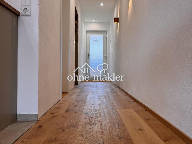 Neu renovierte,teilmöbelierte Wohnung mit Einbauküche, Balkon und Tiefgaragenstellplatz
