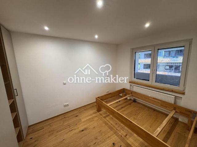 Neu renovierte,teilmöbelierte Wohnung mit Einbauküche, Balkon und Tiefgaragenstellplatz