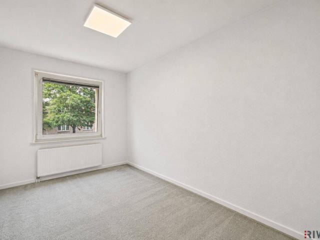 Neubauwohnung mit Grünblick und 4 Zimmer Möglichkeit in einem gepflegten Haus
