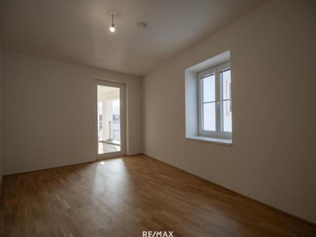 Neubauwohnung im Stadtzentrum mit Ausbaupotenzial & Dachterrasse