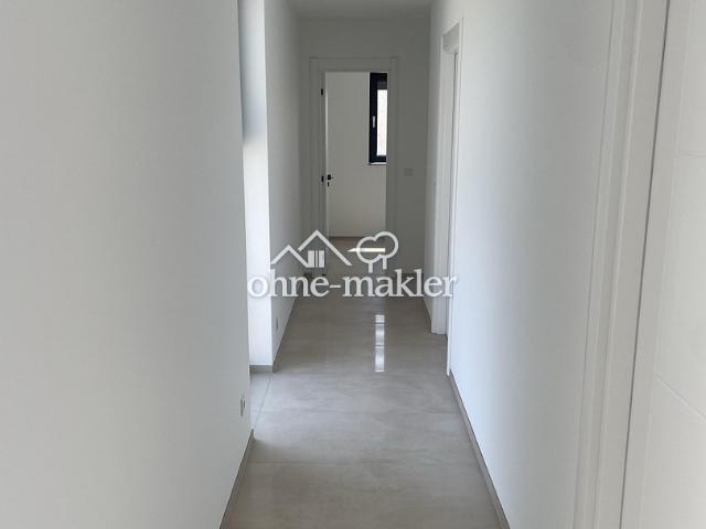 Neubau 3 Zimmer direkte Feldrandlage