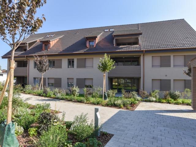 Neubau Gartenwohnung mit moderner Haustechnik und offenem Grundriss